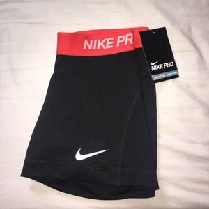 Nike pro shorts with a red band